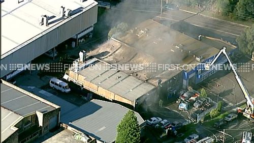 The factory is believed to contain a panel beating shop. (9NEWS)