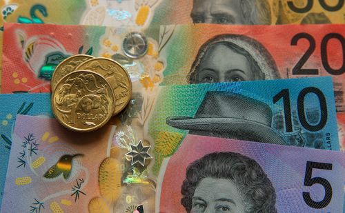 Australian $50, $20, $10 and $5 banknotes and dollar coins.