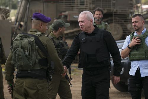 Israeli Minister of Defence Yoav Gallant meets soldiers on the Israeli border with the Gaza Strip on October 19, 2023 in Sderot, Israel