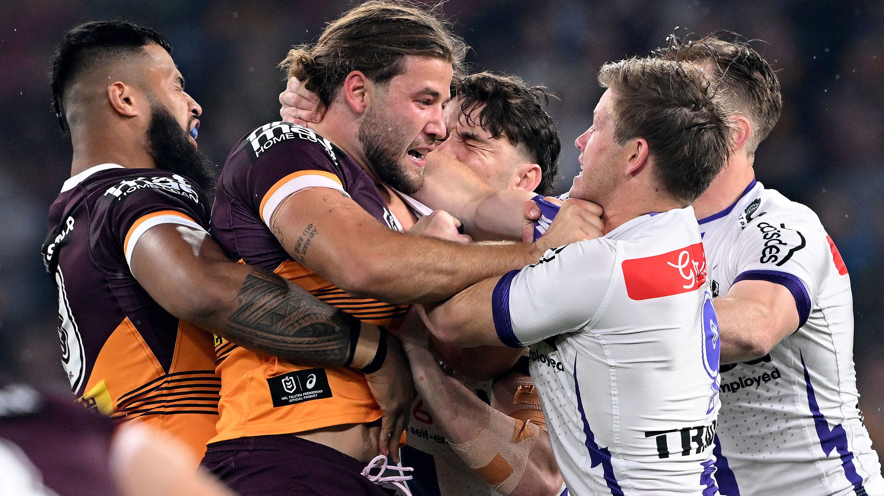 Pat Carrigan and Harry Grant lock horns in the Broncos&#x27; 2023 qualifying final clash with the Storm as Payne Haas (left) and Cameron Munster (right) get involved.