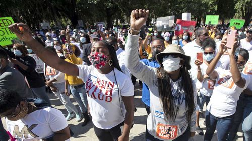 Protesters take to the streets in Brunswick, Georgia, to demand justice over the death of Ahmaud Arbery.