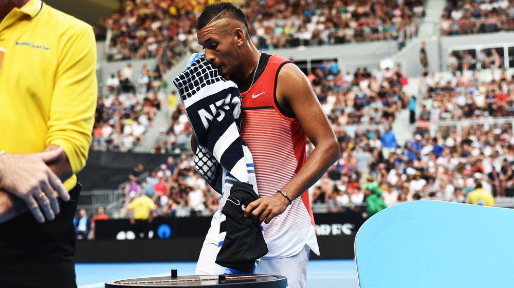 Nick Kyrgios goes to change his shorts. (AAP)
