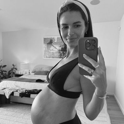 Chloe Fisher showing off her baby bump