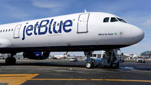 A jetBlue plane on the tarmac.