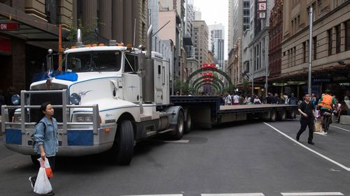 A truck was placed across Pitt Street to protect Boxing Day shoppers from potential vehicle rampages. (Supplied)