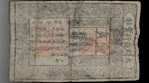 Seven hundred year old Chinese banknote found inside Buddhist head set to be auctioned in Sydney