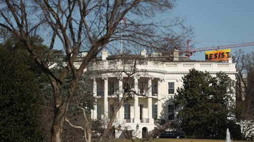 The banner is visible from the White House. (AAP)