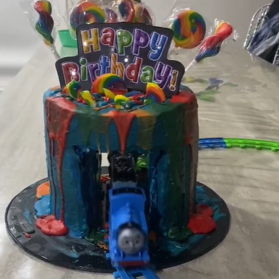 Rainbow coloured 1st Birthday Cake, Chocolate mud layered w…