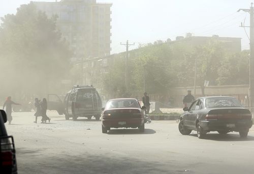 Dust fills the air after the explosion. Picture: AAP