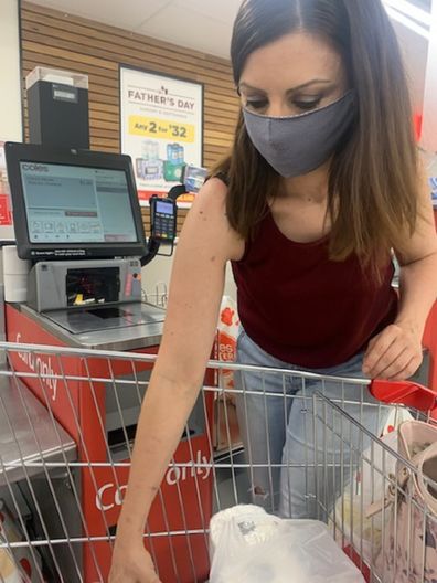 Jo Abi paying for Coles products for grocery comparison