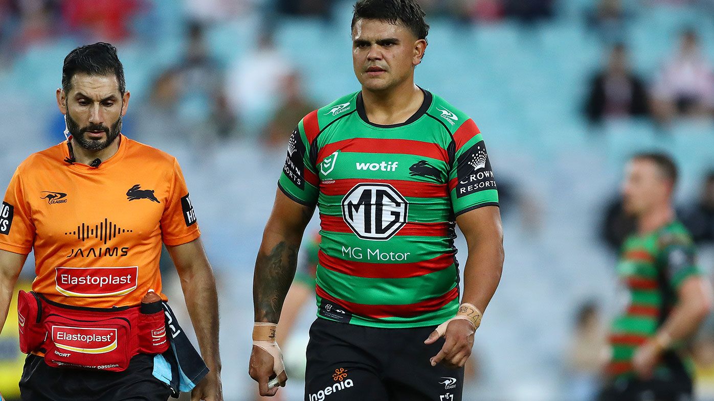 Latrell Mitchell of the Rabbitohs walks off the field