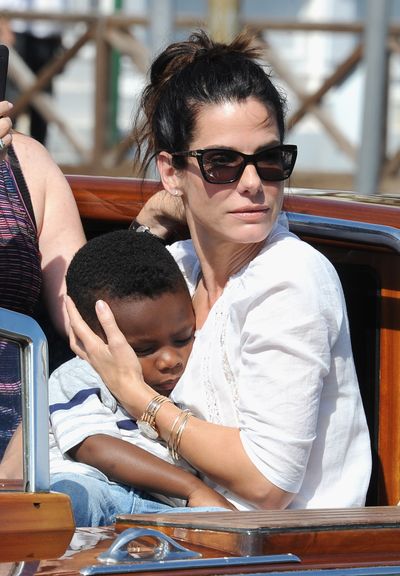 <p>Actress Sandra Bullock began the adoption process for her son, Louis, when she was married to Jesse James. Once they split after news of his alleged affairs came out - Sandra continued as a single parent and later adopted a daughter Laila in 2015.</p>