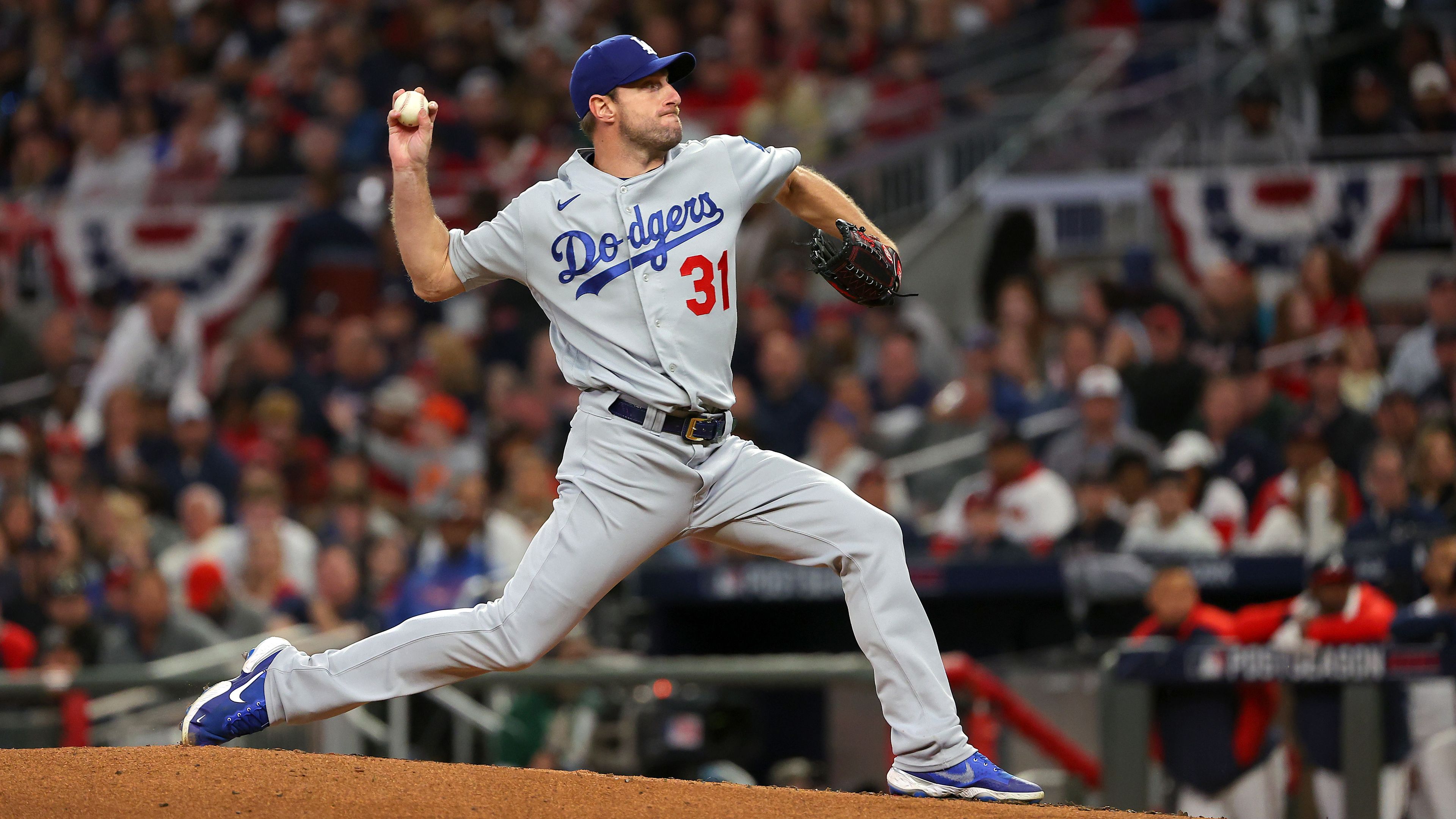 Max Scherzer of the Los Angeles Dodgers pitches against the Atlanta Braves.
