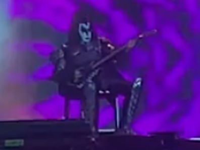 KISS star Gene Simmons ill on stage, performs seated on a chair