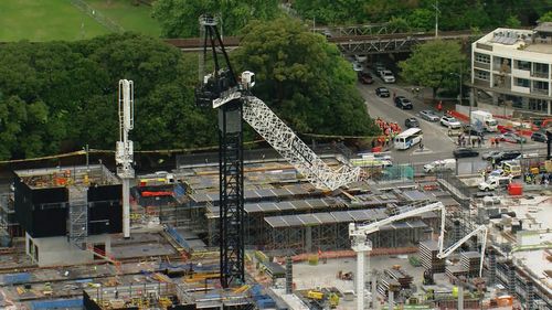 A crane has collapses at the Sydney Fish Market building site.