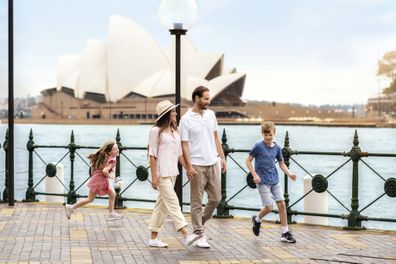 Family enjoying a stroll on Sydney Harbour. 