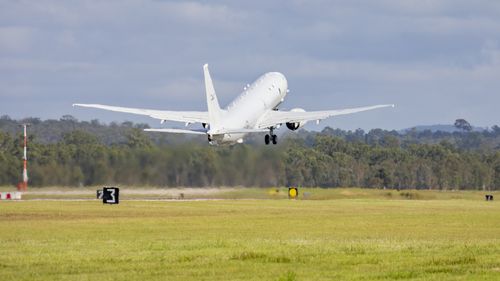 A Royal Australian Air Force P-8 Poseidon aircraft departs RAAF Base Amberly, Queensland to assist the Tonga Government after the eruption of the Hunga-Tonga-Hunga-Ha'apai volcano.