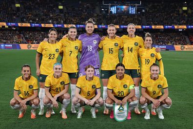 Matildas players pose for a team photograph ahead of their international friendly match with France.