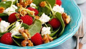 Raspberry, spinach and Persian feta salad with salted candied walnuts
