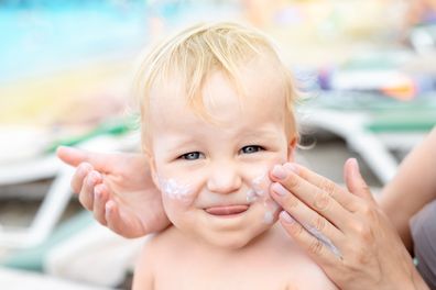 Baby with sunscreen on