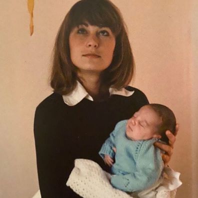 Carole Middleton holding Kate as a baby