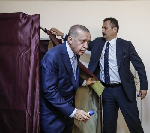 Turkey's President and Presidential candidate, the leader of Justice and Development Party (AKP) Recep Tayyip Erdogan, casts his vote at a polling station at Saffet Cebi Middle School in the Uskudar district of Istanbul, Turkey (Can Erok/Dha/Depo Photos/ABACAPRESS.COM)