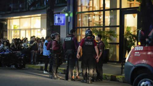 Police gather outside a hotel where Liam Payne, a former member of the band One Direction, was found dead after falling from a balcony in Buenos Aires, Argentina, Wednesday, Oct. 16, 2024.