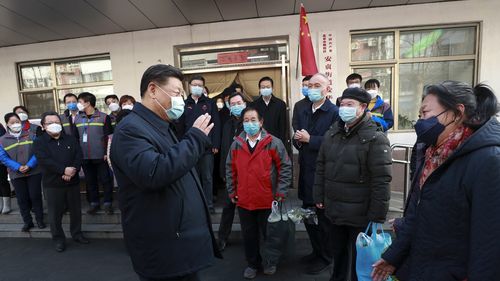 President Xi Jinping was eeen greeting staff and residents outside the hospital during his visit.