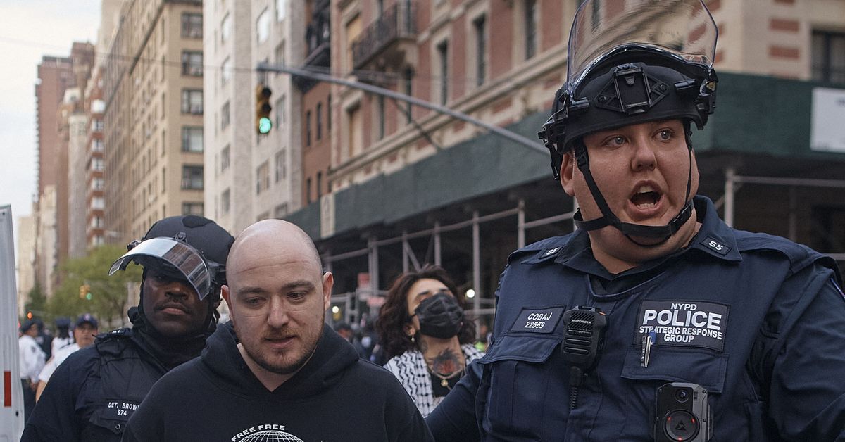 Police arrest protesters outside Met Gala