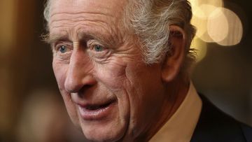 King Charles III speaks with guests during a reception and ceremony commemorating the 50th anniversary of the Resettlement of British Asians from Uganda in the UK, at Buckingham Palace in London, Wednesday Nov. 2, 2022 