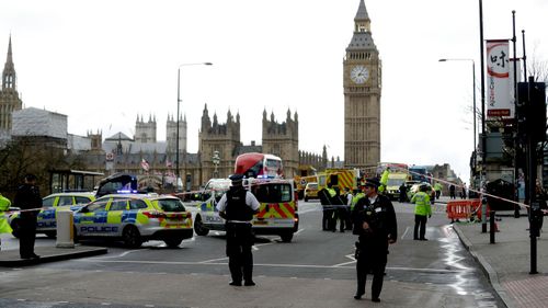 Police lockdown Westminster Bridge in central London after a terrorist incident. (AAP)