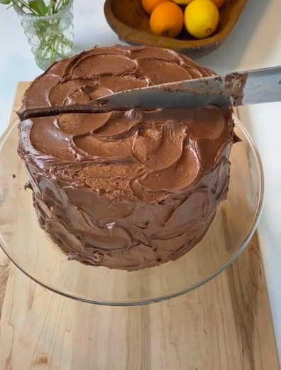 Chocolate cake being sliced