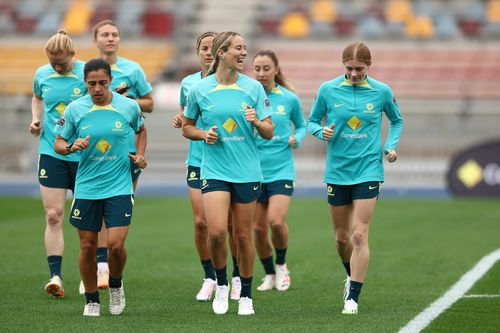 BRISBANE, AUSTRALIA - JULY 17: Players run during an Australia Matildas training session ahead of the FIFA Women's World Cup Australia & New Zealand 2023 Group B match between Australia and Ireland at Queensland Sport and Athletics Centre on July 17, 2023 in Brisbane, Australia. (Photo by Chris Hyde/Getty Images)