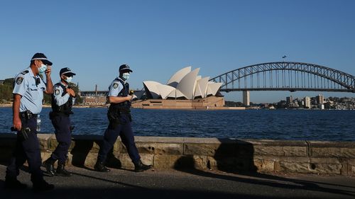 NSW Police patrol the Sydney Harbour shorefront.