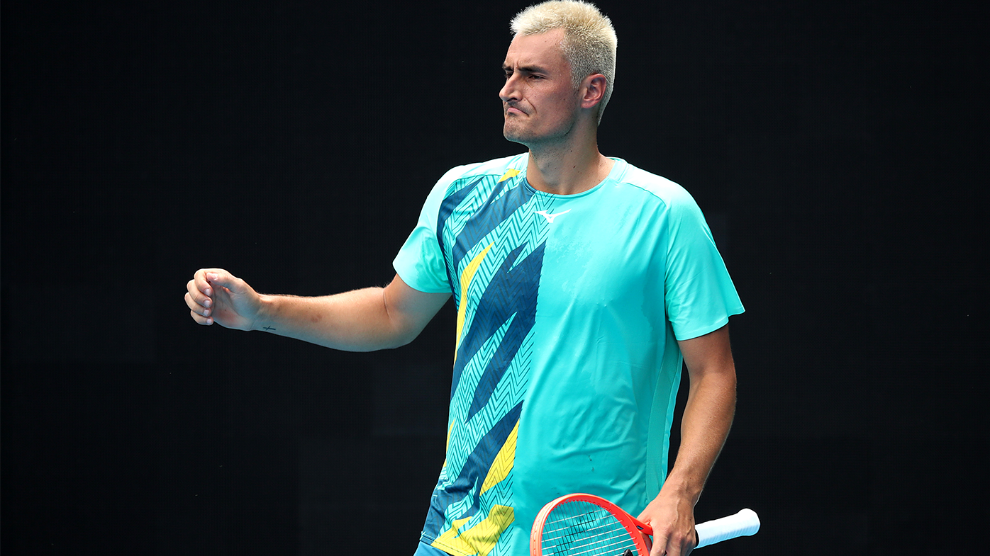 Bernard Tomic reacts in his match against Roman Safiullin during the 2022 Australian Open qualifying.