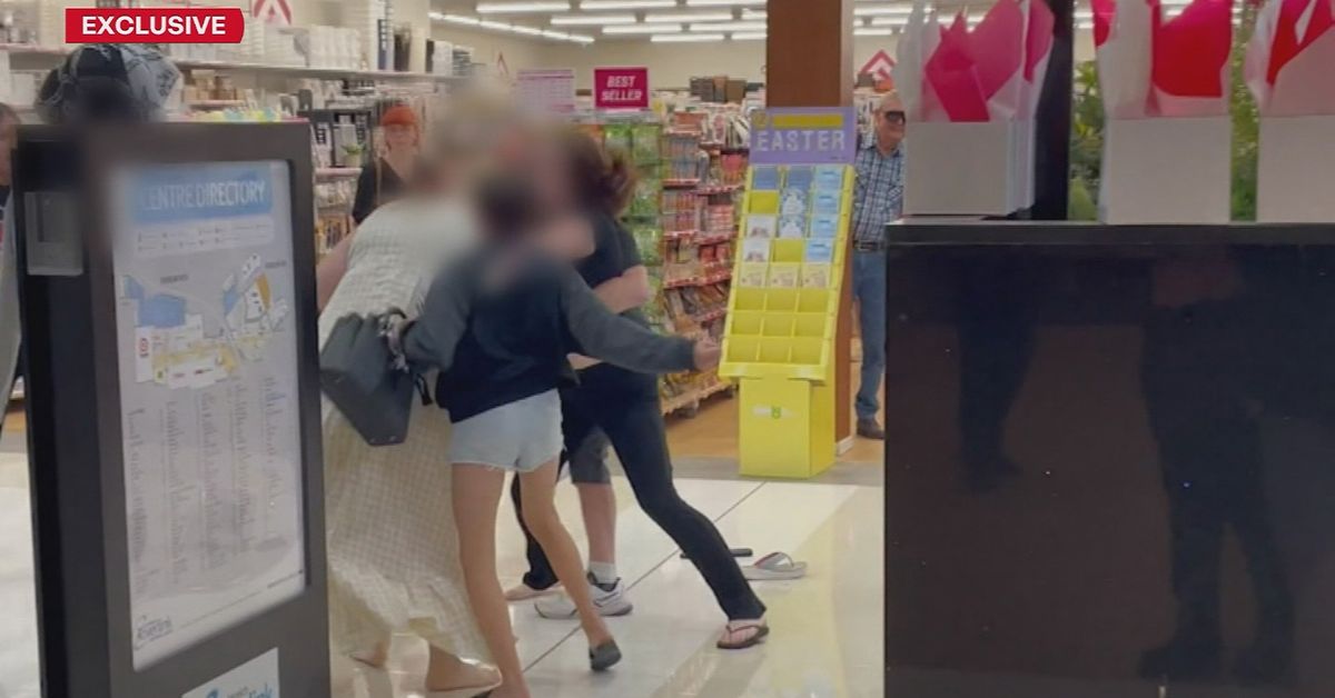 Shocking footage emerges of two brawling families inside Queensland shopping centre
