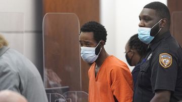FILE - Tony D. Earls is escorted from the Harris County 263rd District Criminal Court Thursday, Feb. 17, 2022, in Houston. Earls, who is accused of fatally shooting a 9-year-old girl when he was robbed at a Houston ATM in 2022, has been indicted Tuesday, April 23, 2024, for murder in her death. The indictment comes nearly two years after another grand jury had declined to indict him in the death of Arlene Alvarez. (Melissa Phillip/Houston Chronicle via AP, File)