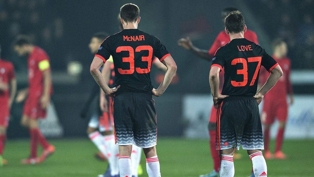 United players contemplate their Europe League loss. (AAP)