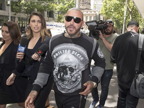 Ex-Bandido bikie Toby Mitchell leaves the Melbourne Magistrates Court. (AAP)