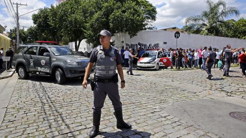 Brazil School shooting ex students nine killed