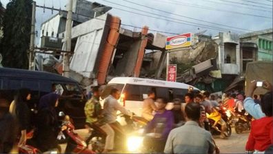 <p>At least ten people including a woman and her two children have been killed after a 6.5-magnitude undersea earthquake hit the Indonesian province of Aceh.</p>
<p>(AFP)</p>