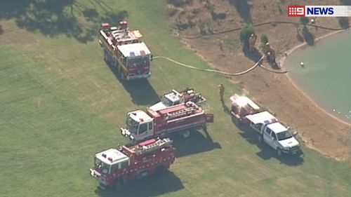 At least 14 fire trucks have attended the scene. (9NEWS)