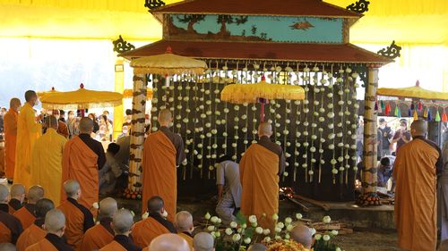 Buddhist monks attend the cremation of Thich Nhat Hanh in Hue, Vietnam.