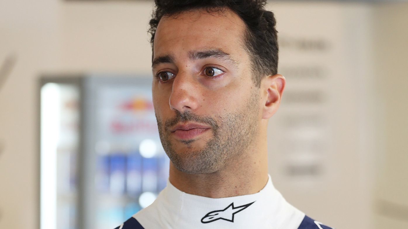 Daniel Ricciardo of Australia and Scuderia AlphaTauri talks with the Scuderia AlphaTauri team in the garage during previews ahead of the F1 Grand Prix of Hungary at Hungaroring on July 20, 2023 in Budapest, Hungary. (Photo by Peter Fox/Getty Images)