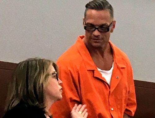 Scott Raymond Dozier, right, during a previous court appearance. He was found dead in his prison cell after his planned execution was twice postponed.