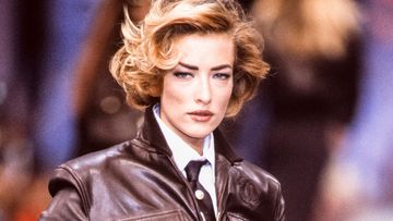 Tatjana Patitz walks the runway at the Chanel Ready to Wear Spring/Summer 1991-1992 fashion show during the Paris Fashion Week in October, 1991 in Paris, France.
