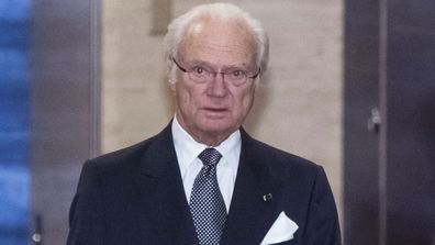 Sweden's King Carl XVI Gustaf arrives at a cocktail party before a banquet hosted by Japan's Prime Minister Shinzo Abe in Tokyo Wednesday, Oct. 23, 2019.