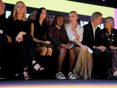 Charlize Theron and daughter Jackson, 11, in the front row of the Dior show at Paris Fashion Week.