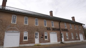 The museum building at the former Genoa Indian Industrial School is seen. For decades the location of the student cemetery, where more than 80 Native American children are buried, has been a mystery.