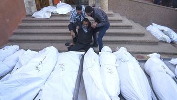 Palestinians mourn their relatives killed in the Israeli bombardment of the Gaza Strip